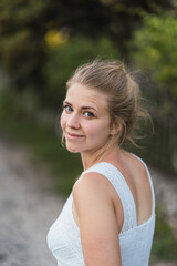 Naklejka premium beautiful young girl taking a walk in the nature