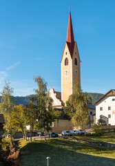View of the bell tower of the Parish Church of Saints Ingenuino and Albuino  in Monguelfo-Tesido,...