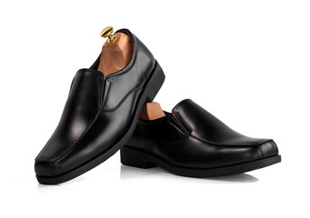 Men fashion black shoes  leather with shoe tree (shape supporter) isolate on white background. Clipping path