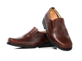 Men fashion brown leather collection loafer shoes with shoe tree (shape supporter) isolated on white background.