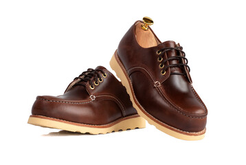 Men fashion brown shoes leather with shoe tree (shape supporter)  isolated on white background. Clipping path