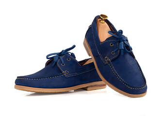 Men fashion blue leather boat shoes with shoe tree (shape supporter)  isolated on white background.