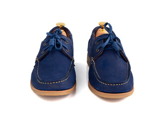 Men fashion blue leather boat shoes with shoe tree (shape supporter)  isolated on white background. clipping path, front view