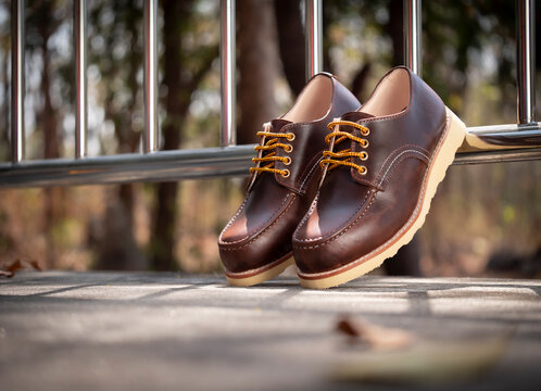 Men fashion brown shoes leather on the floor.