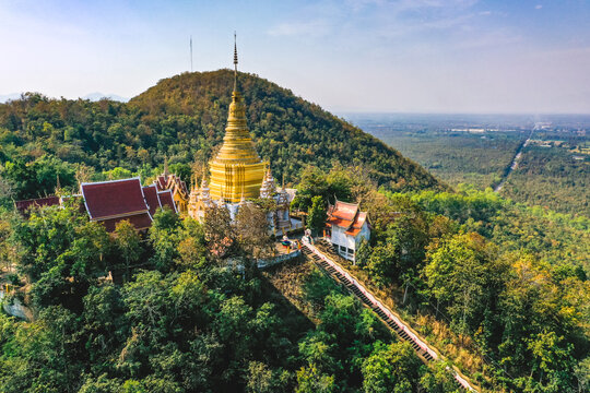 Aerial view of Wat Phra Phutthabat Tak Pha temple on top of the mountain in Lamphun, Thailand