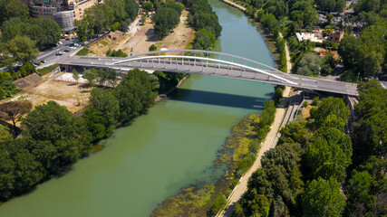 The Ponte della Musica-Armando Trovajoli is a bridge in Rome that crosses the Tiber. Made of steel and reinforced concrete, it is reserved for cycle, pedestrian and public transport use. 