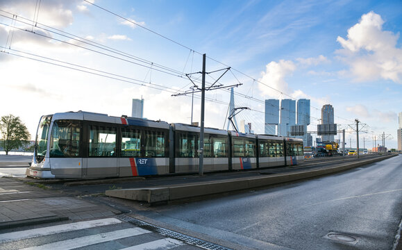 Public transportation in Rotterdam. Tram photographed in the center of the city next to Erasmus Bridge and Hofplein Square. Netherlands, 2022.