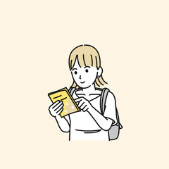 地図　ガイドブックを見る　旅行をする若い女性　一人旅