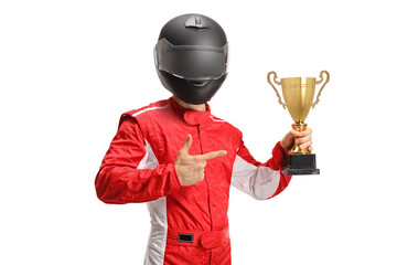 Car racer winner with a black helmet holding a gold trophy cup and pointing at it