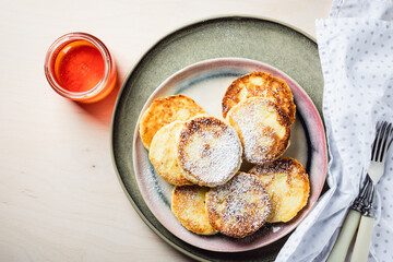 Cottage cheese pancakes with honey.