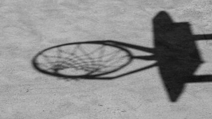 Fototapeta na wymiar Shadow on the floor of a basketball hoop, close-up.