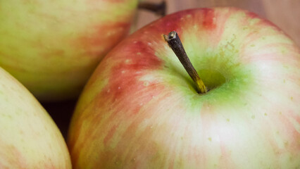 A few ripe apples, a close-up shot. Macrophoto of fruits.