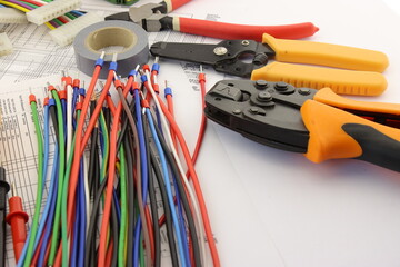 Mounting tools on the electrical diagram in close-up.