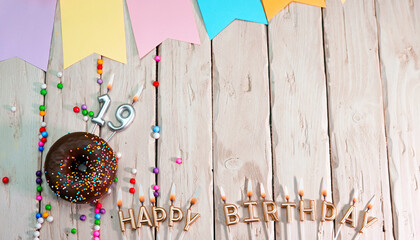 Birthday with number 19. Donut on the festive table. Happy birthday congratulations top view. Happy...