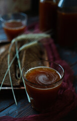 Traditional homemade beverage kvass in glass and bottles is a good summer cooling drink.