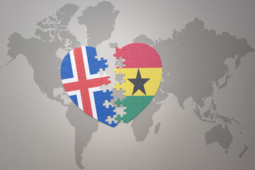 puzzle heart with the national flag of ghana and iceland on a world map background. Concept.