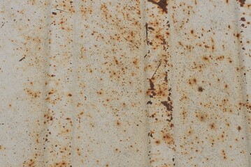 gray brown metal texture from dirty old rusty iron wall