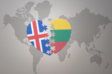 puzzle heart with the national flag of lithuania and iceland on a world map background. Concept.