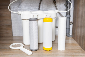 House water filtration system. Installation or replacement of water purification filters under...