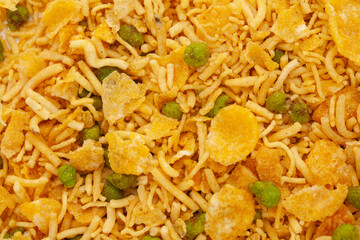 Crunchy Diet Mixture full-frame wallpaper, made with Puffed Rice, Corn Flakes, and Curry leaves. Indian spicy snacks (Namkeen)