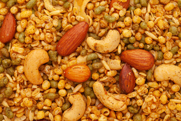Close-Up of Kashmiri Mixture (Namkeen)  snacks, made from dry fruits, cashew nuts,  moong dal. Indian spicy snacks (Namkeen), full frame, wallpaper, background..