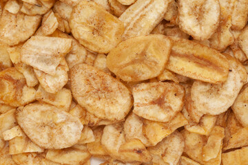 Close-up of Crunchy salty banana chips Full-frame wallpaper, made fried banana  Indian spicy snacks (Namkeen),