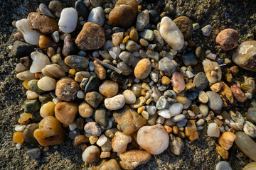 Hundred colourful beach pebbles in Afitos, Greece