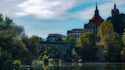castle in the background of an river 