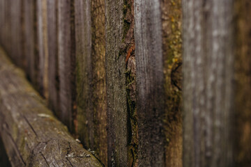 Old rustic wooden fence close-up