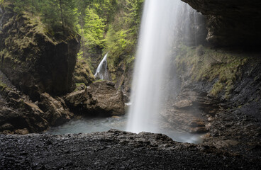 Fototapeta na wymiar Berglistüber waterfall in Switzerland near Linthal and Klausenpass