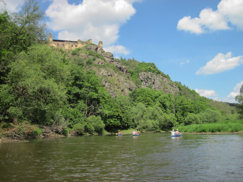 Canoeing on the river, boating and castle ruins on a rock
