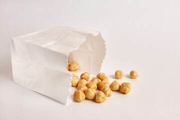 Hazelnuts fell out of the paper bag. Food packaging.