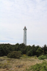 Fototapeta na wymiar Lighthouse on the coast in Jutland, Denmark