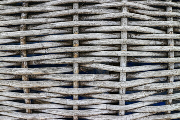 Verwittertes Hintergrund Geflecht eines Strandkorbs aus Weiden  