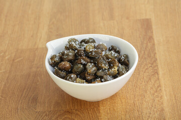 Salted marinated capers snack appetiser