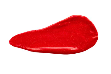 Red lipstick smear smudge swatch isolated on white background. Cream makeup texture. Bright color cosmetic product stroke swipe sample
