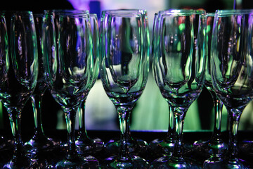 Empty glass glasses in green.