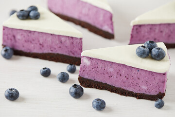 dessert cake with blueberries on a white background with blueberries