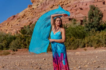 A Beautiful Model Poses Outdoors Near Ait Ben Haddou in Morocco, Africa
