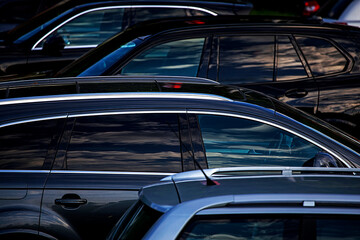 background of parking cars in an open parking lot, horizontal