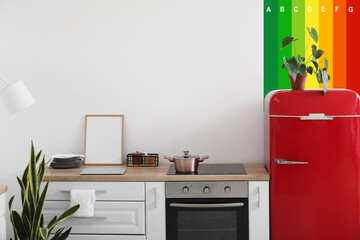 Interior of modern kitchen with red refrigerator. Concept of smart home
