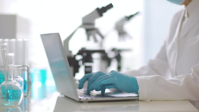 scientist working on computer