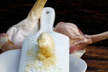 garlic on the porcelain grater