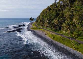 Beautiful views of the coast of the island of sao tome and prince. High waves crashing against the...