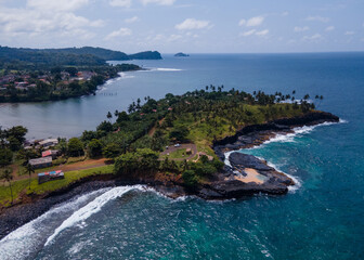 Beautiful views of the coast of the island of sao tome and prince. High waves crashing against the rocks.