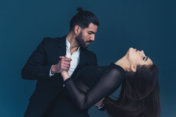 handsome man holding his woman's waist and enjoying pastime with her. close up photo. High quality photo