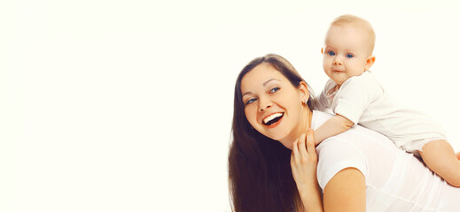 Portrait of happy smiling mother playing with baby together on white background, blank copy space...