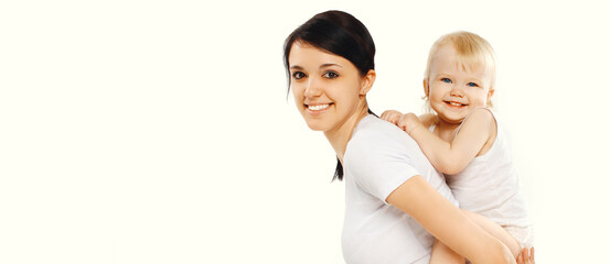 Portrait of happy smiling mother playing with baby together on white background, blank copy space for advertising text