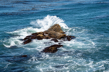 waves crashing on rocks