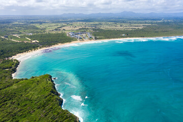 Stone cliff washes with Atlantic ocean. Macao beach. Dominican Republic. Aerial view